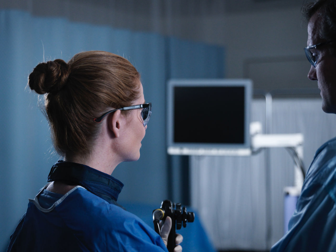 Healthcare provider working at computer.