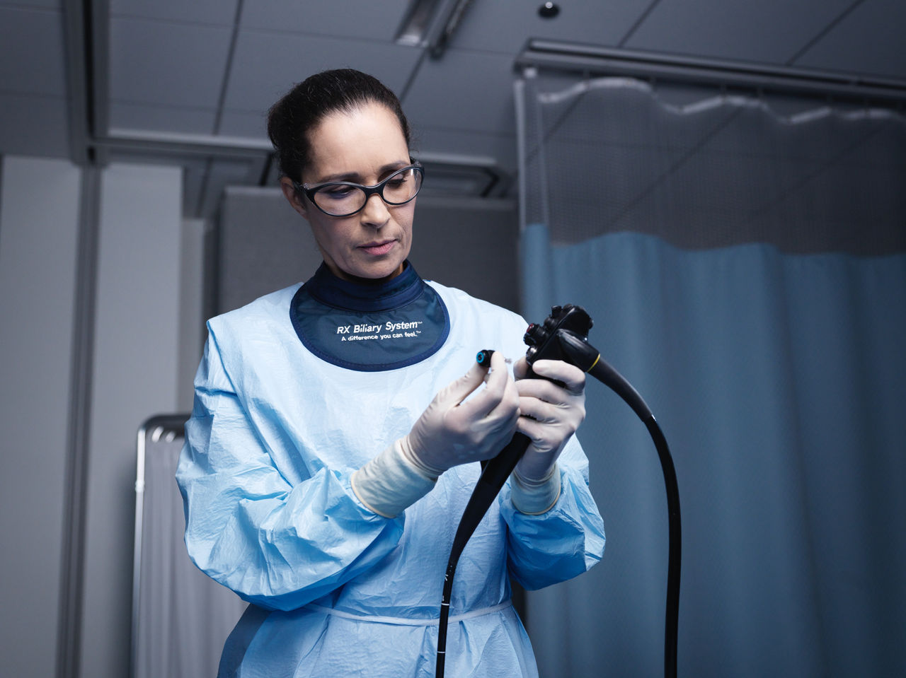 Health care provider working in surgical setting.