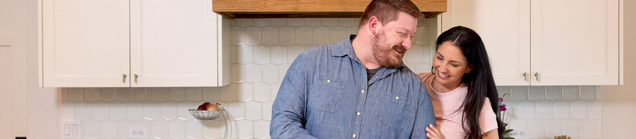 Healthcare provider consulting with patient using tablet.