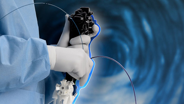 Doctor demonstrate a medical device machine.