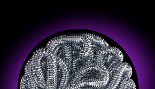 Embold packing coil device wrapped in a circle on black background with purple hue
