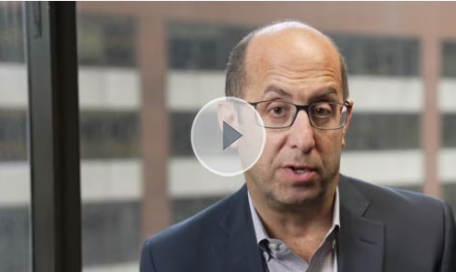 Video screenshot with play button of Dr. Gary Siskin speaking.