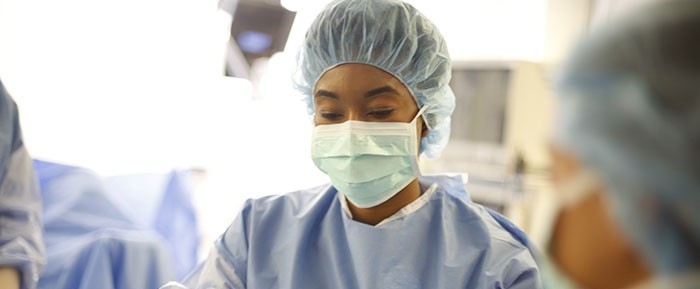 Female physician in surgery. 