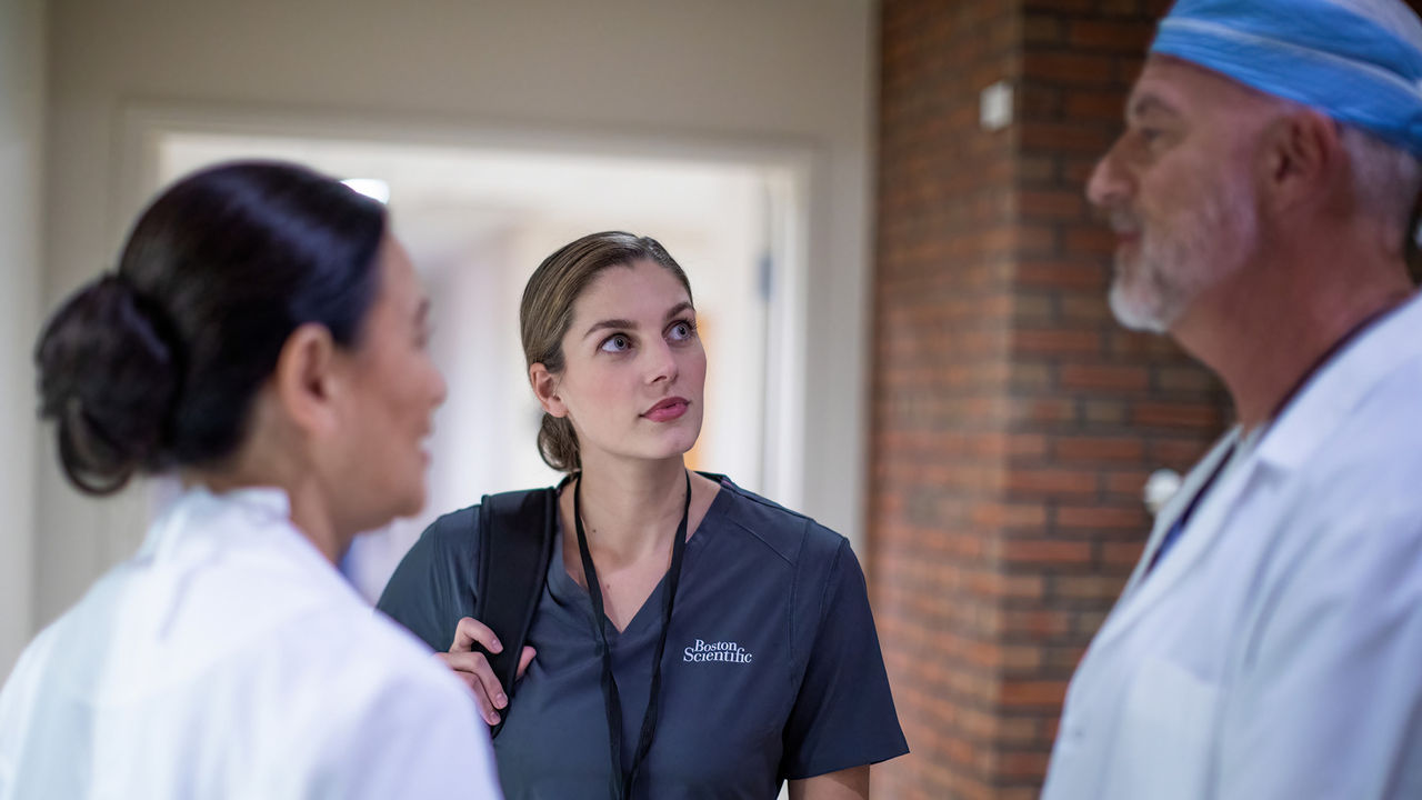 Boston Scientific medical team collaborating in a hospital corridor 