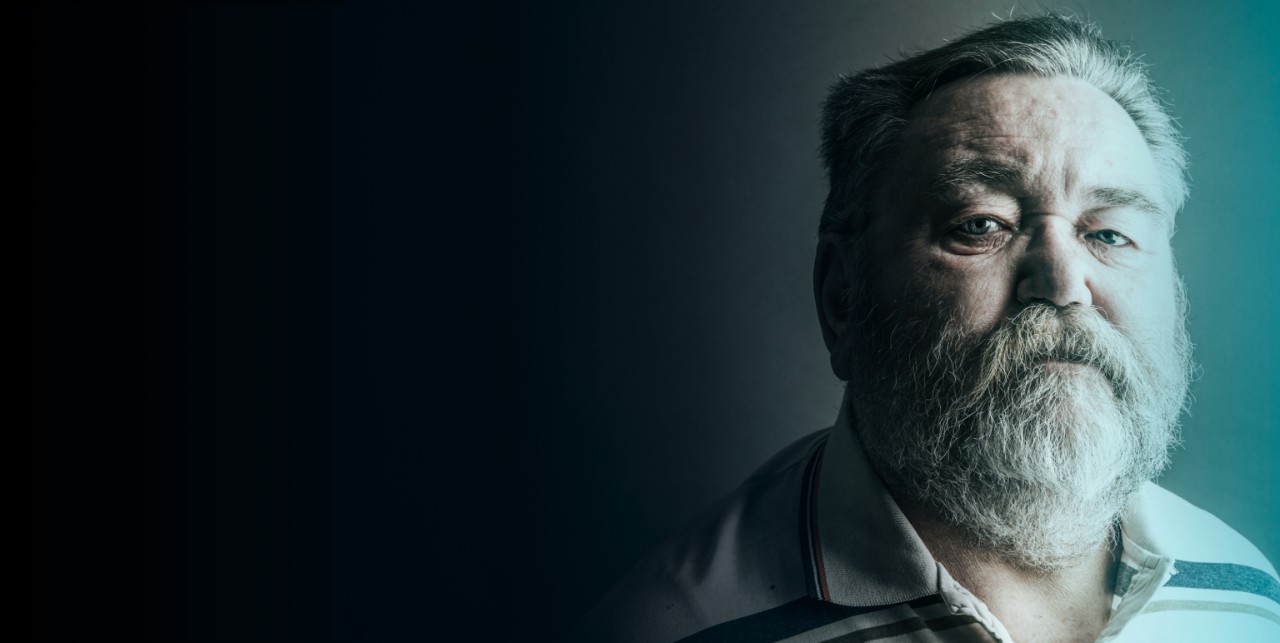 Older patient looking directly at the camera.