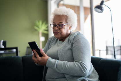 woman viewing smartphone device