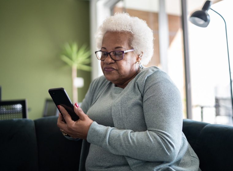 woman viewing smartphone device