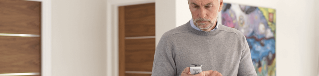 man using remote control.