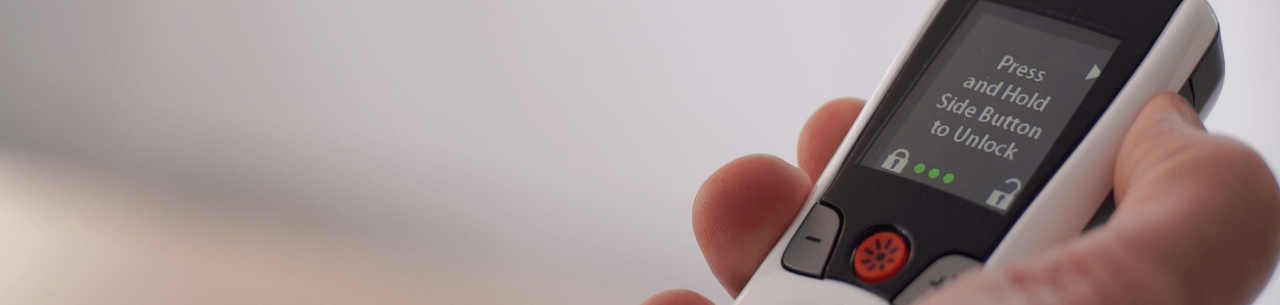 Freelink remote close-up in hand.