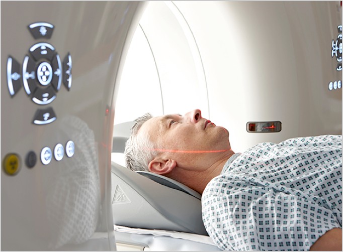 Patient undergoing a full body MRI scan with ImageReady MR Conditional Systems.