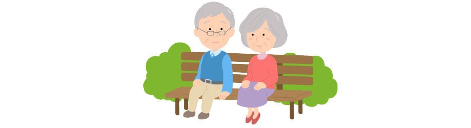 ベンチでゆっくりしている老夫婦